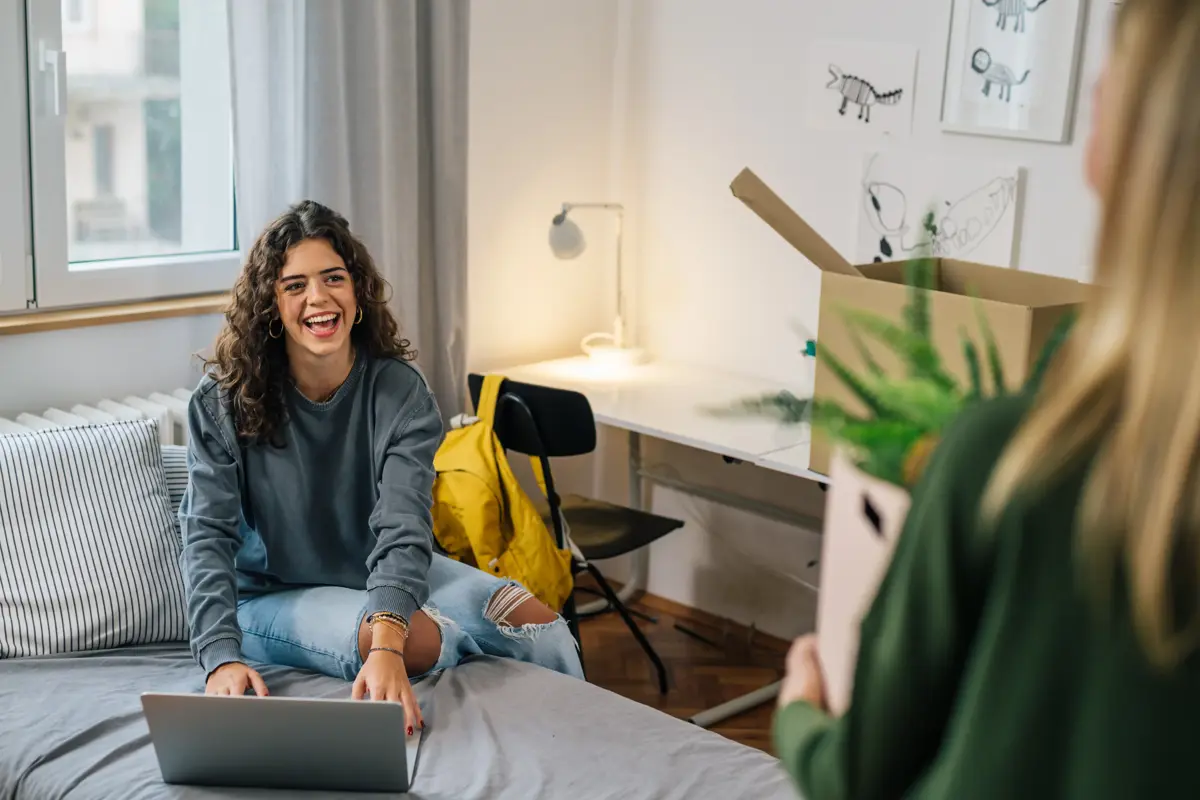 Girl On Laptop Talking Friend Student