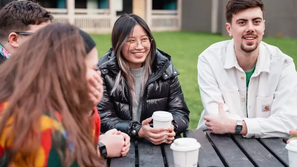 group of student friends spending time together.webp